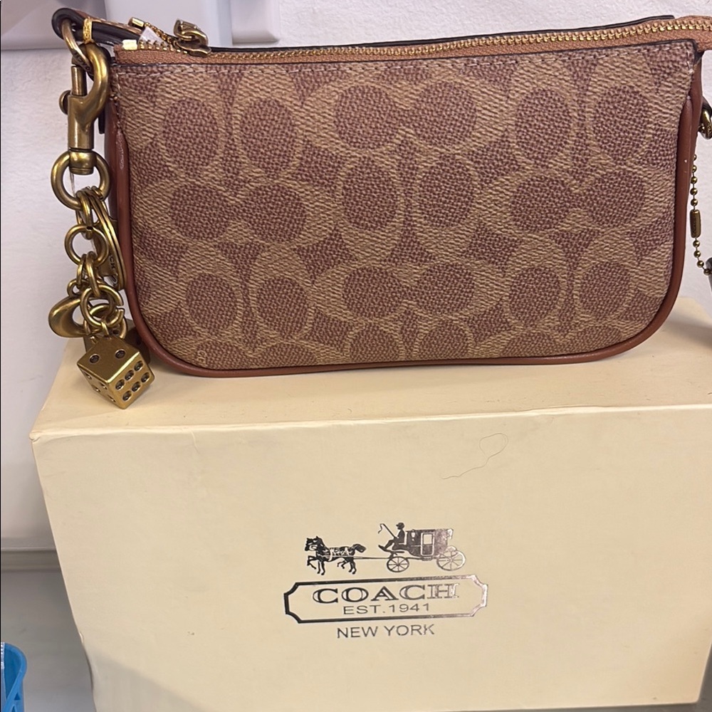 Coach Signature Canvas Wristlet in Brown with Dice Charm